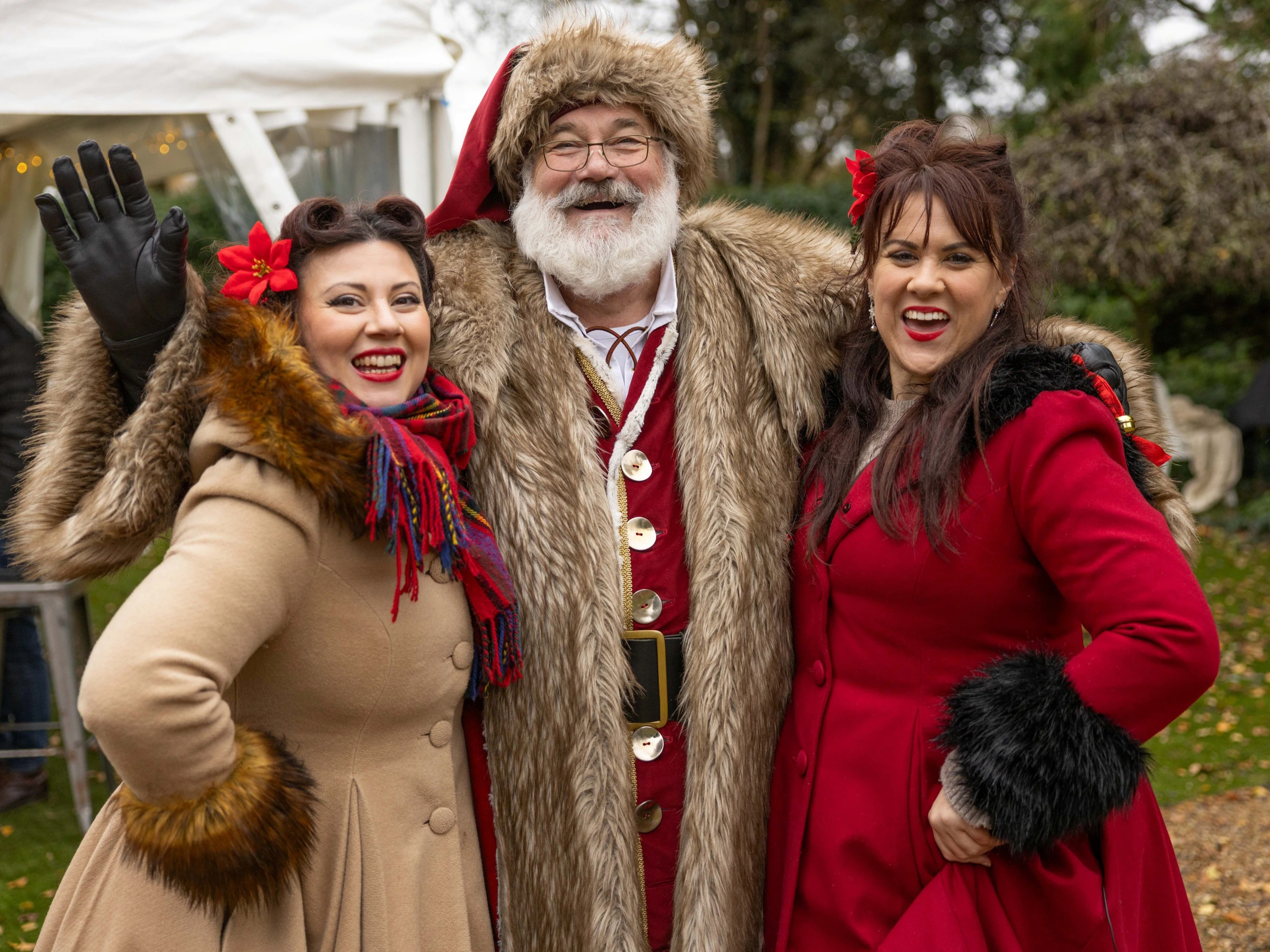 Father Christmas with festive singers at the Essex County Christmas Fair