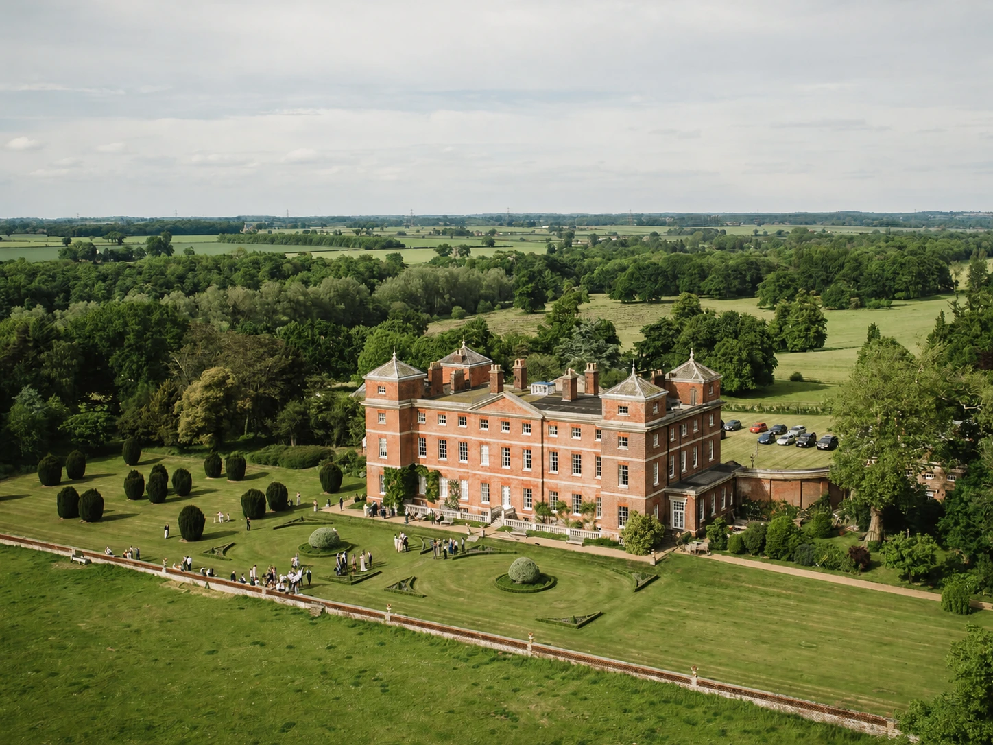 Aerial view of Kimberley Hall and its formal gardens in Norfolk